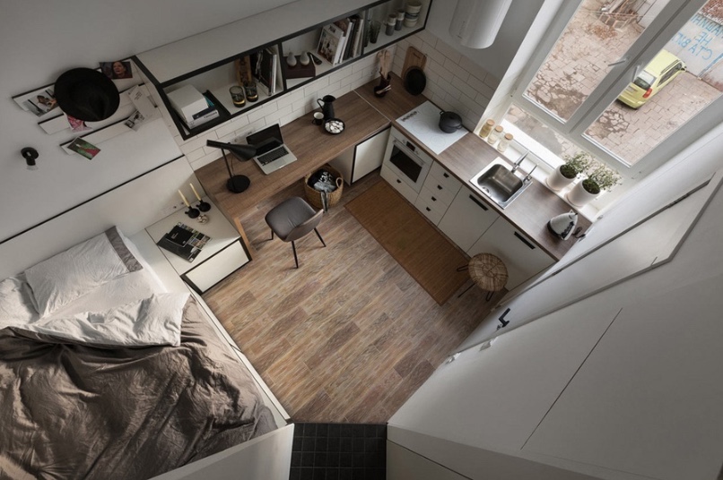 Căn hộ studio 35m2 được bố trí thông minh với góc làm việc liền bếp, gọn gàng nhưng đầy đủ tiện nghi